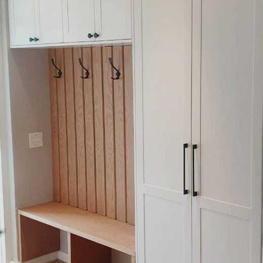 Built-in hallway cupboards with coat hooks